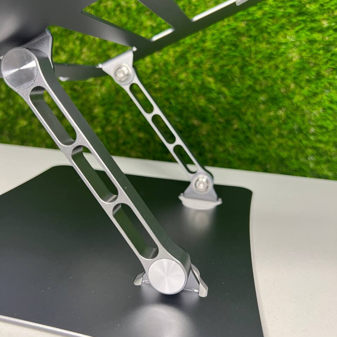 Soporte metálico ajustable para laptop con base antideslizante