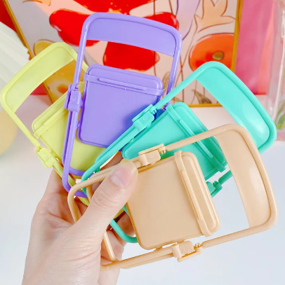 Soporte de celular en forma de silla, holder compacto y versátil